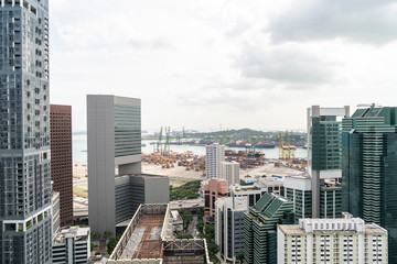 Picturesque panoramic view of Singapore city at day time. Financial and trading center hub in Asia region. Concept of success. Modern buildings in high-tech world.