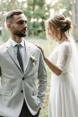 the bride put her hand on the groom,newlyweds wedding holiday,wedding couple