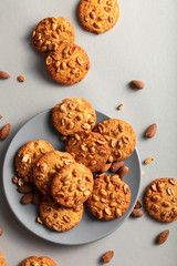 Biscuits on a plate top view. White background and copy space. Vkusnoe biscuits for Breakfast in the plate.