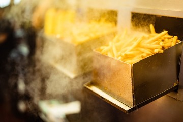 Fresh fries come out with steam