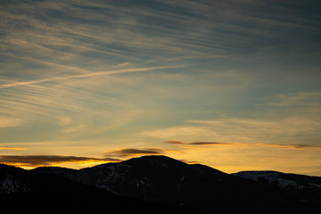 Snowy mountains silhouette in Catalonia with clear sky during sunset