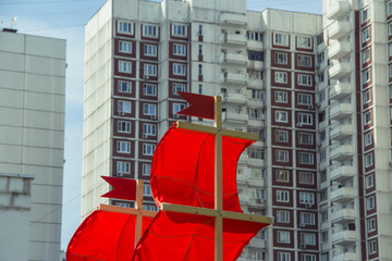 festival sail in front of a building