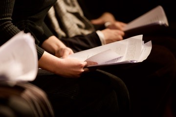 young woman reading a script