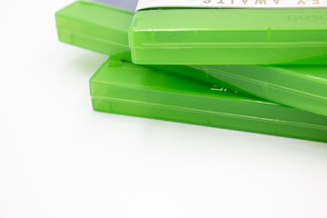 Stack of console games with copy space