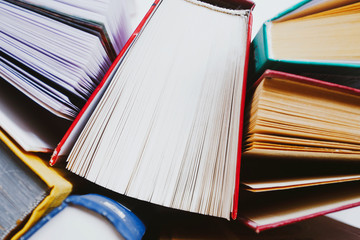 Naklejka premium Educational books on a white background. Education concept.