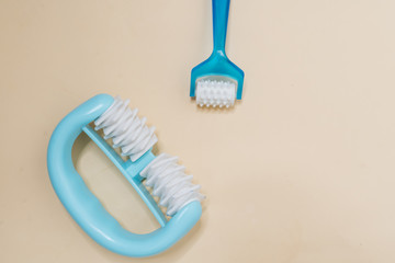 Instruments for massage on the beige background 