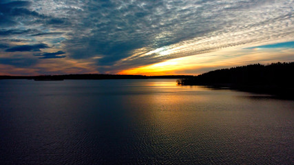 Beautiful sunset on Sääksjärvi beach in Nurmijärvi, Finland