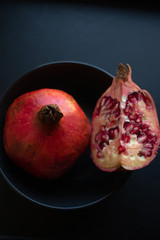 pomegranate on black background
