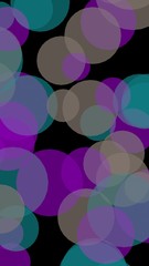 Multicolored translucent circles on a dark background. 3D illustration