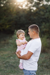 Fototapeta premium Happy family outdoors spending time together