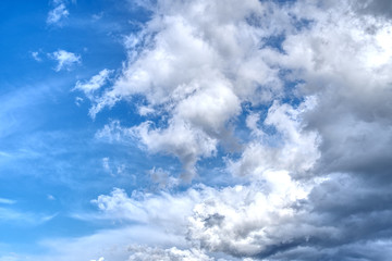blue sky background with tiny clouds before hard rain