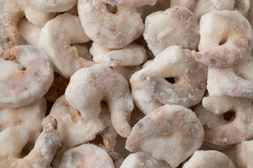 Frozen raw shrimps full frame close up