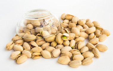 roasted pistachios on white background