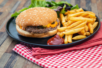Cheese burger - American cheese burger with Golden French fries