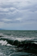 View of storm seascape, storm in the sea with big waves and dark sky