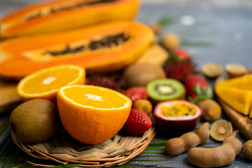 Exotic fruits on wooden chopping board