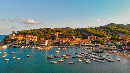 Fototapeta na wymiar Marina Di Campo, Elba Island. Beautiful aerial view of townscape in Italy