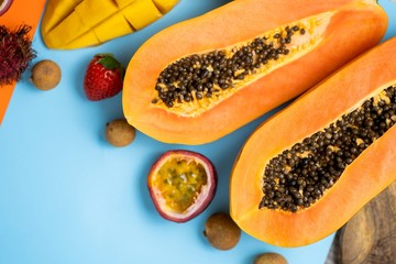 Exotic fruits on colored background