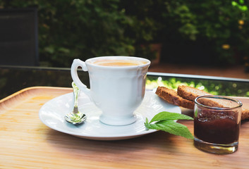 Coffee with milk and toast