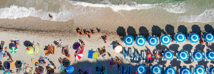 Beautiful aerial view of beach umbrellas in summer season