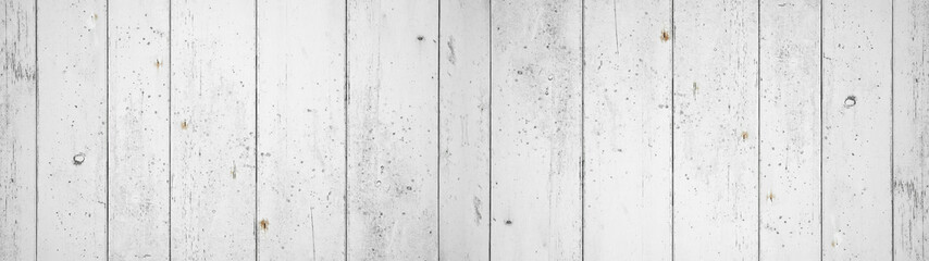 Old white painted exfoliate rustic bright light wooden texture - wood background banner panorama shabby 