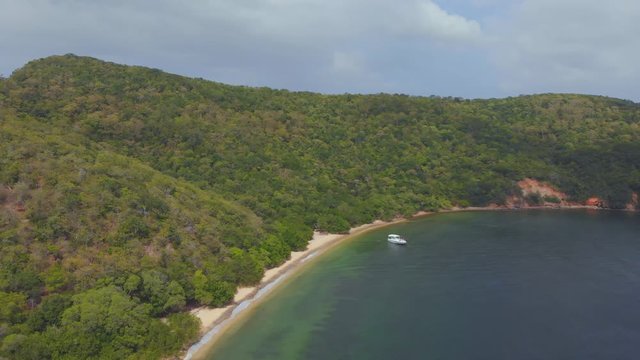 A yacht anchored at this amazing secluded beach destination on Chacachacare island in the Bocas del dragon region of Trinidad