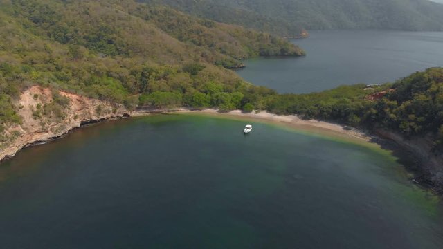 Epic aerial of La Tinta Bay on Chacachacare island just seven miles from the coastline of Venezuela in the Bocas del Dragon region