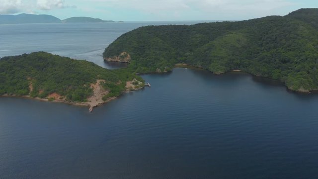 Aerial view of Perruquier Bay in the Bocas del Dragon region in Trinidad and Tobago with the mountains of Venezuela in the background