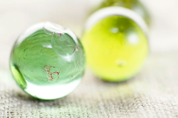 Industrial glass marble damaged, imperfect, used worn shattered chipped character. Bottle green group of 3.