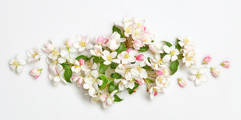 Blossom spring composition on white background. Beautiful pink bloom flowering bouquet, top view. Creative fashionable trendy flat lay. Springtime blooming concept.