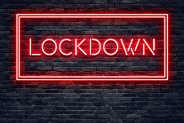 Lockdown Red Neon Sign on dark brick wall - Powered by Adobe