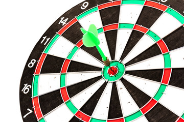 Dartboard with darts on white background, closeup. Purpose concept