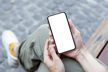 cell phone Mockup image blank white screen.woman hand holding texting using mobile at coffee shop.background empty space for advertise.work people contact marketing business,technology