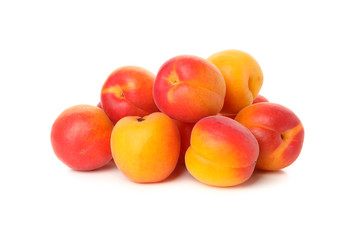 Fresh tasty apricots isolated on white background