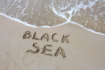 Fototapeta premium inscription on the sea sand black sea