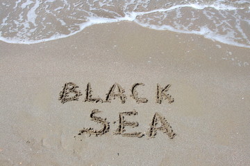 Fototapeta premium inscription on the sea sand black sea