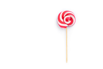 One red lolly pop isolated