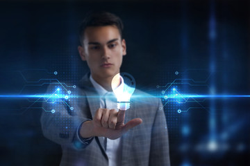 Business, Technology, Internet and network concept. Young businessman working on a virtual screen of the future and sees the inscription: