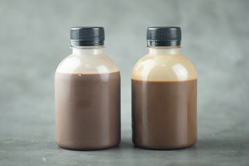 Two plastic bottle of tasty cocoa milk
