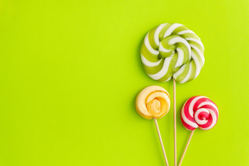 Lollypops yammy candy on a colored background