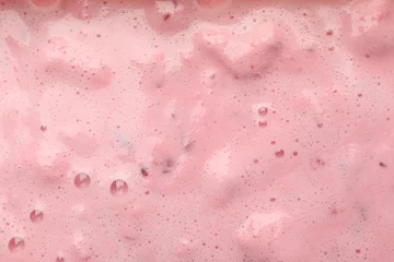 Foto op Plexiglas Delicious berry milkshake on whole background, close up © Atlas