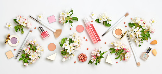 Beauty cosmetic makeup background. Fashion trendy woman make up product, brushes lipstick and blossom. Creative concept. Cosmetology make-up accessories banner, top view