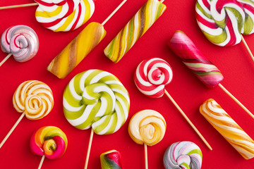 Lollypops yammy candy on a colored background