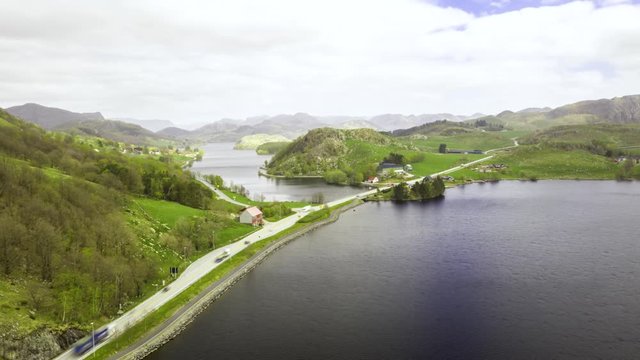 Drone Hyperlapse of Countryside Road Between Lakes in Picturesque Landscape of Norway, Aerial View