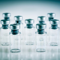 Medicine bottles, blank ampoules ready for vaccine, 3d illustration