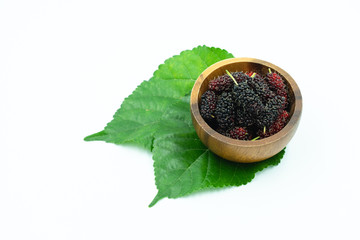 Fresh mulberry and green leaf on white background