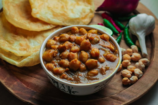 Chole Bhture or Chana masala is a Famous Indian dish originated initially from eastern Uttar Pradesh in the northern part of the Indian subcontinent.