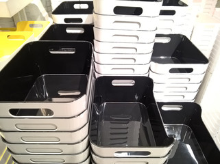 Stack of plastic container box storage. Plastic containers for home use stack in a store for sale....