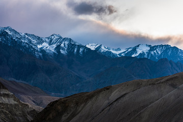 Landscape of snow mountains in Leh Ladakh with cloudy sky