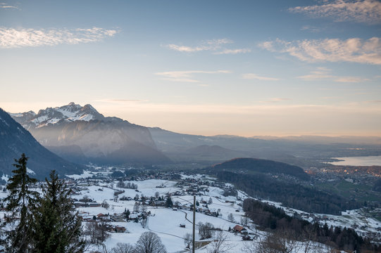 Overlooking Aeschiried, Spiez And Lake Thun On A Winter Sunset